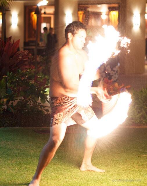 The brave fire knife dancer concentrates during his performance.