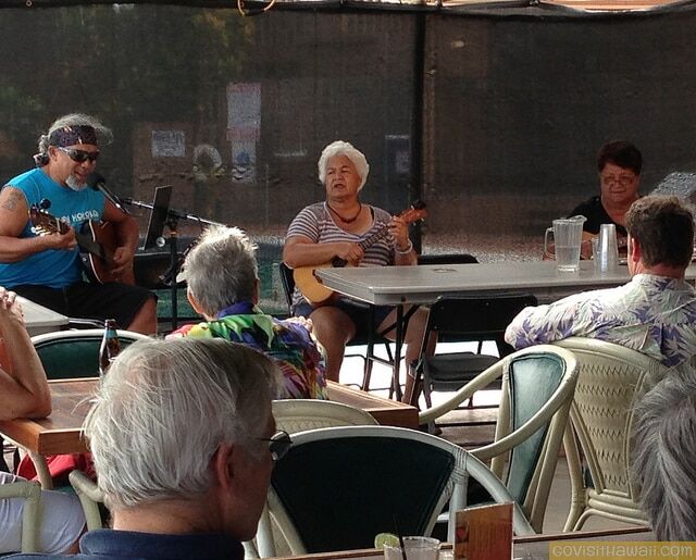 Molokai kapuna share Hawaiian music at Aqua Molokai Hotel on Friday evenings.